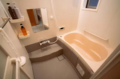 a bathroom with a sink and a bath tub at SAYO Serene Traditional Home, 8-min walk to JR Yamanote Line in Tokyo