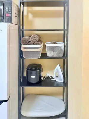 a shelf in a refrigerator with some items on it at Tokyo Stay Itabashi #102 in Tokyo