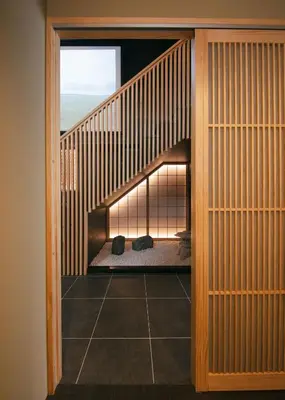 a room with a staircase with a bed in it at A-LifePENTHOUSE in Tokyo