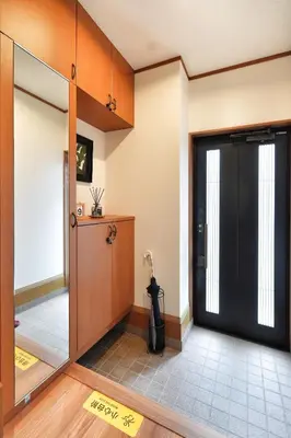 an entrance to a room with a black door at Tokyo Tsuruga Villa\u30fc\u6771\u4eac\u96c5\u9db4 in Tokyo