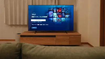 a flat screen tv sitting on a wooden stand at Kiryo Tokyo Kami Itabashi 2 Bedroom Apartment with Kitchen near Ikebukuro in Tokyo