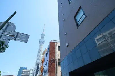a view of the eiffel tower from the street at Asakusa Kototoibashi Facing Tokyo Skytree in Tokyo