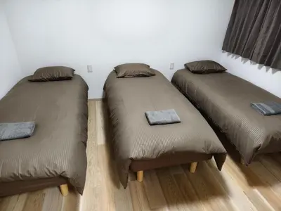 a room with two beds with pillows on them at Makino Building - Vacation STAY 14797v in Tokyo