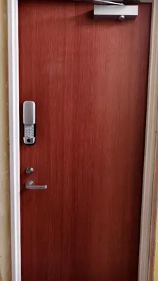 a wooden door with a cell phone on it at Makino Building - Vacation STAY 15981v in Tokyo