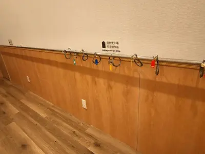 a row of pairs of glasses on a wall at Makino Building - Vacation STAY 15661v in Tokyo