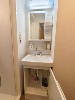 a bathroom with a sink and a mirror at Makino Building - Vacation STAY 15661v in Tokyo