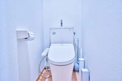 a bathroom with a white toilet in a room at BMO102A Direct bus to Disney from next station Max5 in Tokyo