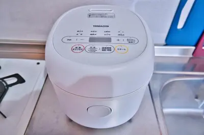 a white toilet sitting in a bathroom next to a sink at BMO102A Direct bus to Disney from next station Max5 in Tokyo