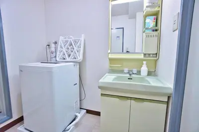 a small bathroom with a sink and a mirror at LCE203 6min Shimo Sta 13min Akabane Max 8 in Tokyo