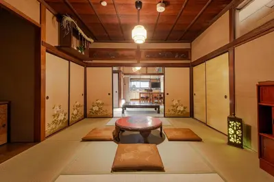 a room with a table in the middle of a room at comin in Tokyo