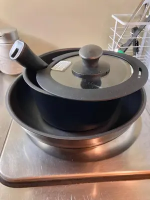 a black pan sitting on top of a stove at 6min Shibuya Station 4 Max A165 in Tokyo