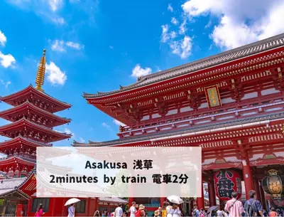 a building with a sign in front of it at Sunny Home Asakusa in Tokyo