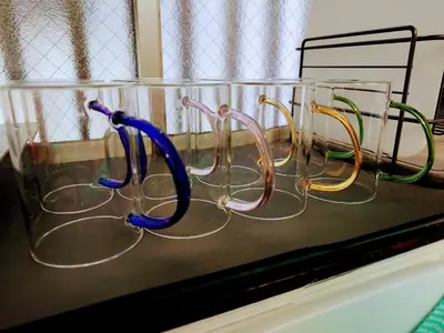 a group of glasses sitting on a window sill at Japanese-Tradtional House Max 8 Guest 6-Min Walk from Station Check-out at 12 PM in Tokyo