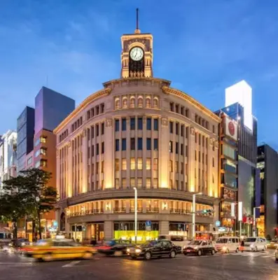 a large building with a clock tower on top of it at bai\u5965\u62382\u4e01\u76ee in Tokyo