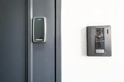 a close up of a door with a metal object at 67LEREVE Ikebukuro in Tokyo