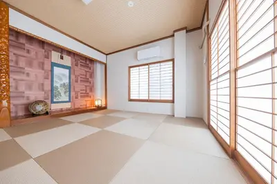 an empty room with windows and a tiled floor at KS Mukoujima in Tokyo