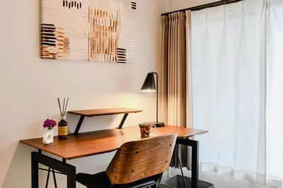 a desk and chair in a room with a window at \u3059\u307f\u308c\u306e\u5bbf in Tokyo