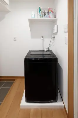a television sitting on a shelf in a room at Life Town Shinkoiwa - Akihabara Direct Access - 7mins walk from sta in Tokyo