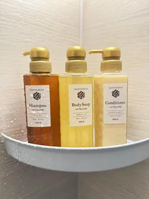three bottles of soap sitting on a shelf at \u6d45\u8349\u99c5\u5f92\u6b698\u5206 \u6d45\u8349\u5bfa\u3059\u3050\u305d\u3070\u306e\u4ef2\u898b\u4e16\u6563\u7b56\u30b9\u30c6\u30a4 DqcSoY in Tokyo