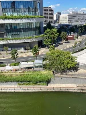 a view of a river in front of a building at YMK Oshiage 7B in Tokyo