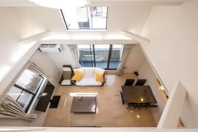 an overhead view of a living room with a couch and chairs at \u304b\u307e\u3082\u30551 in Tokyo