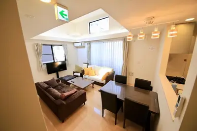 a living room with a couch and a table at \u304b\u307e\u3082\u30551 in Tokyo