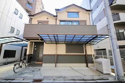 a bike parked in front of a building at \u304b\u307e\u3082\u30551 in Tokyo