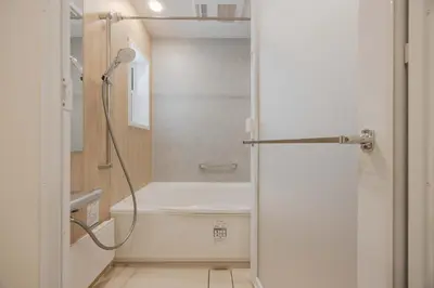 a bathroom with a shower with a bath tub at First Choice Minami Kamata in Tokyo