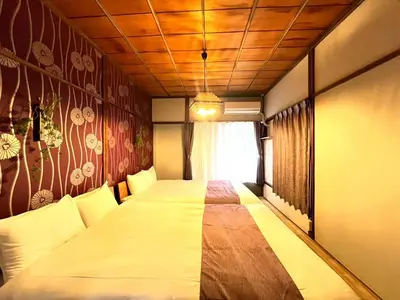 a bedroom with a large bed in a room at Akabane Nishi kodate AN1 in Wada