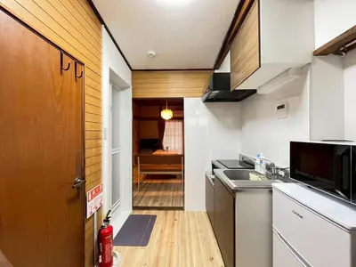 a kitchen with a sink and a counter top at Akabane Nishi kodate AN1 in Wada