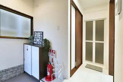 a room with a refridgerator and a window at miraisya shinkoiwa in Tokyo