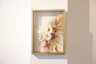 a picture of a bouquet of flowers on a wall at Miu Hotel Togoshi Ginza - Festival Vibes Every Day with Easy Access to Landmarks, Bullet Train & Airports in Tokyo