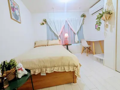 a bedroom with a bed and a window at The Tokyo Okubo Shinjuku Homestay in Tokyo