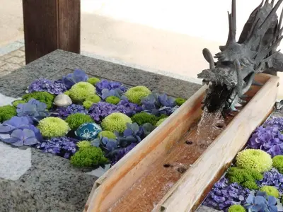 a succulent garden with a fountain in the middle at Asakusa 5 Chome One Bedroom KazeNoItsu 101 in Tokyo