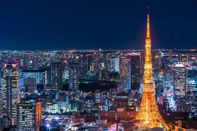 a view of the eiffel tower at night at \u30d5\u30e9\u30c3\u30c8\u5409\u6751 202 in Tokyo