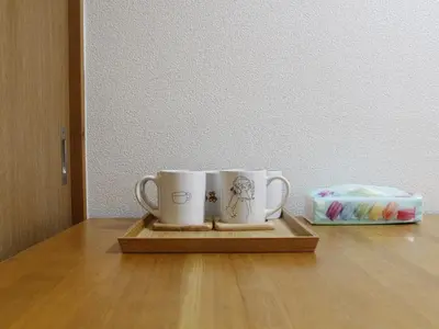 two coffee mugs sitting on a wooden tray on a table at New\u5927\u4e45\u4fdd 2 bedroom tatami room in Tokyo