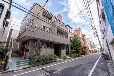 a building on the side of a street at Fukuei Stay Premium in Tokyo