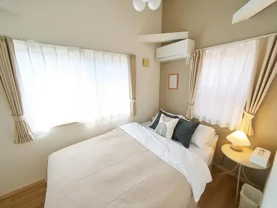a bedroom with a white bed and a window at The Prime TOKYO SKYTREE - Vacation STAY 66636v in Tokyo