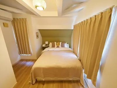 a bedroom with a large bed in a room at The Prime TOKYO SKYTREE - Vacation STAY 66636v in Tokyo