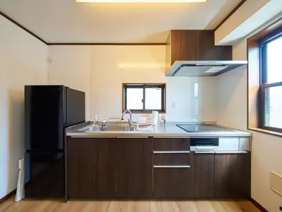 a kitchen with a sink and a refrigerator at The Prime TOKYO SKYTREE - Vacation STAY 66636v in Tokyo
