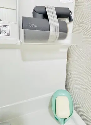 a mouse and a box on top of a refrigerator at sunflower house in Tokyo