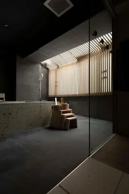 a room with a group of tables and a large window at suirow \u7fe0\u697c in Tokyo