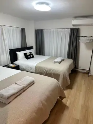 a hotel room with two beds in a room at Otsuka, Bunkyo-ku, House-BK0457 in Tokyo