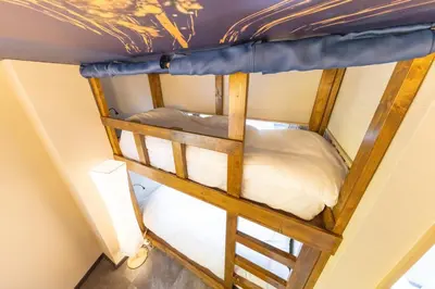 an overhead view of a bunk bed in a room at Luum Stay Shibuya 2 in Tokyo