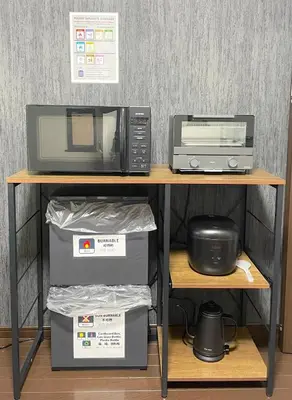 a microwave and a toaster oven on a table at jtr\u6771\u5927\u4e952\u4e01\u76ee in Tokyo