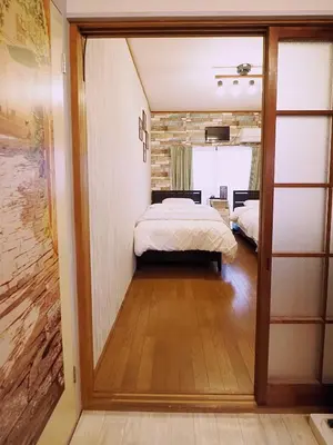 a bedroom with a bed in a room at 202 Koiwa st private Room in Tokyo