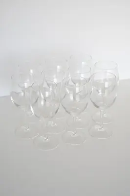 a group of wine glasses sitting on a table at KASHIMA -JR Otsuka Station- in Tokyo