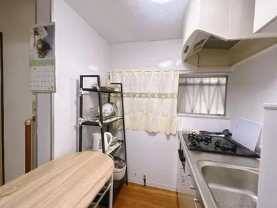 a small kitchen with a sink and a stove at \u6c60\u888b1F 2bedrooms Suite Cozy for 1-4 guests in Tokyo