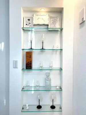 a shelf with glass vases on it at Y-city house in Tokyo
