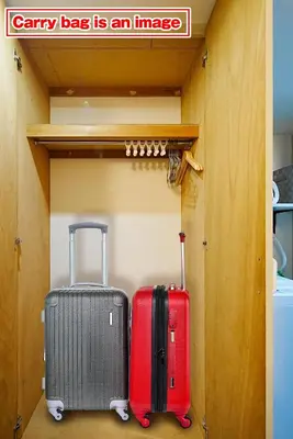 two suitcases are sitting inside of a room at SC 105 Cozy Private Stay with Loft Near Station Free WiFi in Tokyo